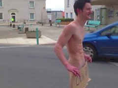 Str8 french guy loses bet, has to stand in traffic naked w/ Free Hugs sign