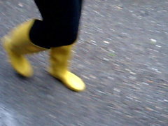In long Zivalco Rubberboots and barefoot on Street and River