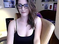 Attractive brunette geek with large breasts talks on liveca
