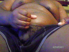 fat black guy masturbating and cum