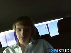 Cute amateur twink Lewis sucking a huge cock on a back seat