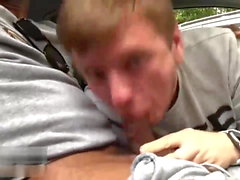 Deepthroating big uncut Russian cock in the car