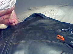 Cum on vintage leather biker jacket wearing two dirty thongs