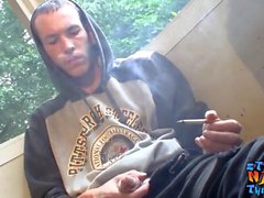 Homosexual thug takes a smoke outdoors and jacks off