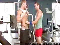 Condom drilling of tattooed guys in the gym