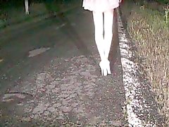 Fanny cd walking loudly in white pump heels on a public road