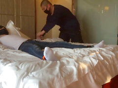 Asian twink gets roped on a hotel bed by a bear