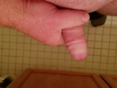 Stroking tiny cock