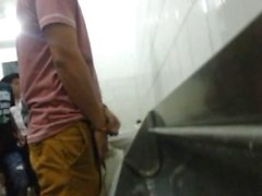 Guys pissing in brazilian music festival