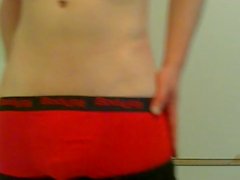 sagging black slim jeans in red boxerbriefs